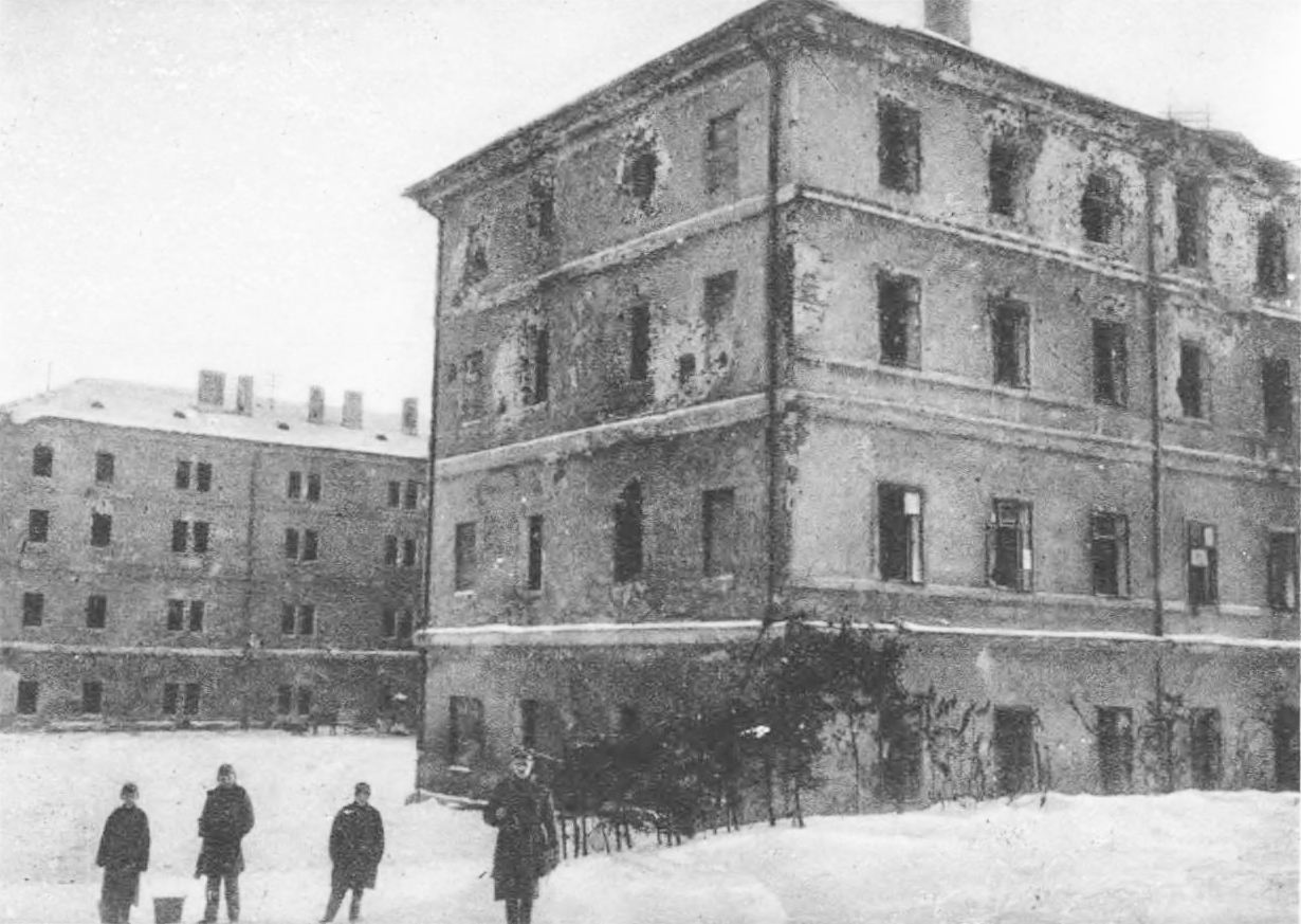 Destruction of the Barracks. The main building as seen from the rear side. Source: Semper Fidelis, 1930