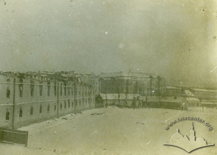 Destroyed barracks. On the background, the residential buildings on Janowska street (today Shevchenka)